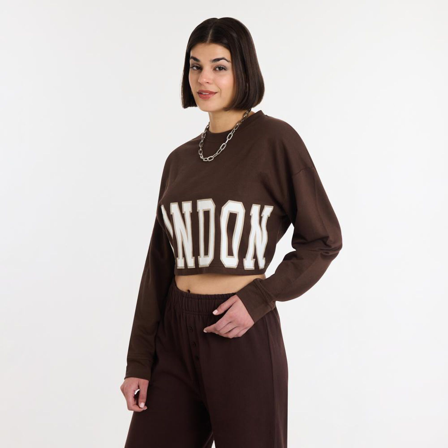 Poler&oacute;n Crop Top Manga Larga Cuello Redondo Mujer Rolly Go image number 2.0