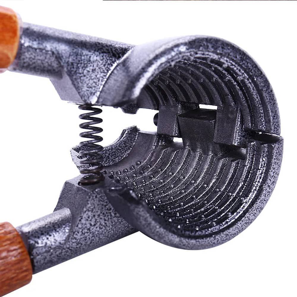 Pelador De Nueces Tipo Alicate Mango Madera Prensador image number 1.0