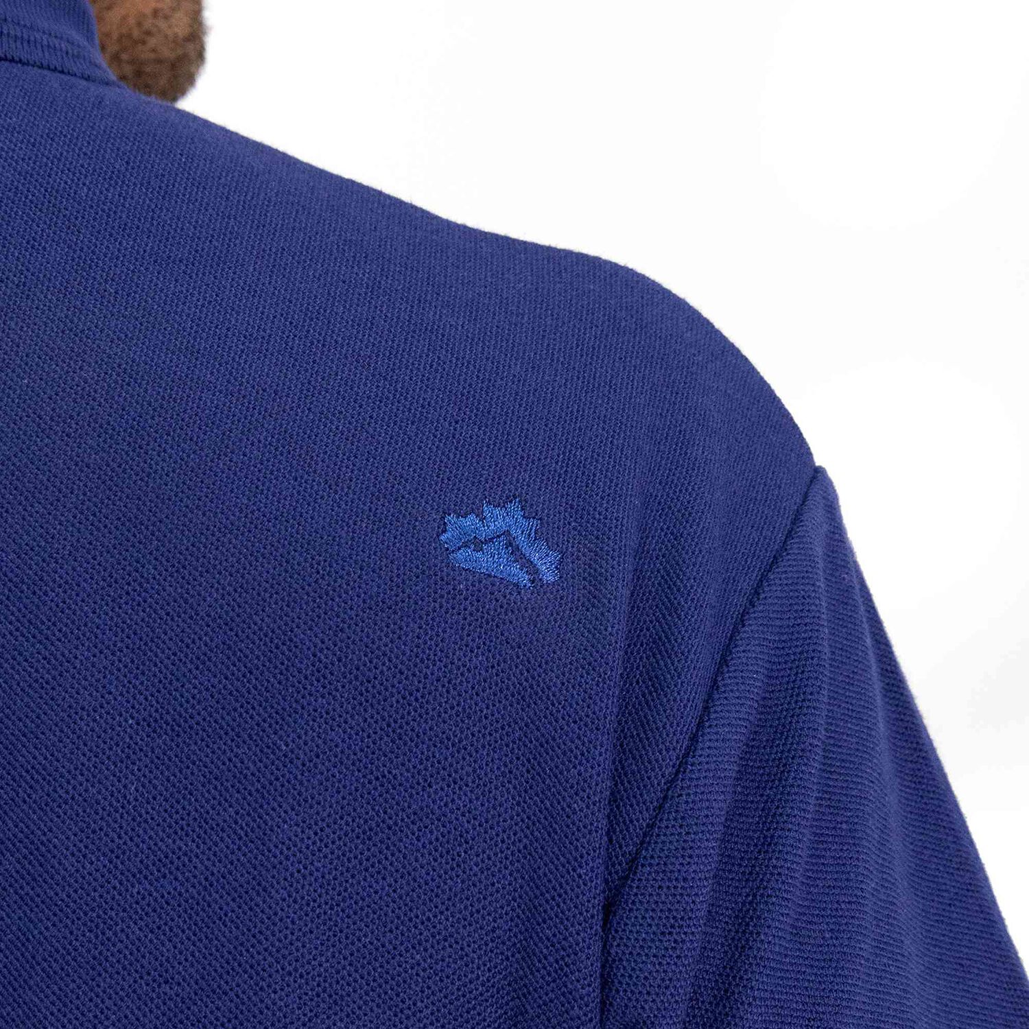 Polera Pique Quebec Manga Corta Azul Hombre image number 7.0