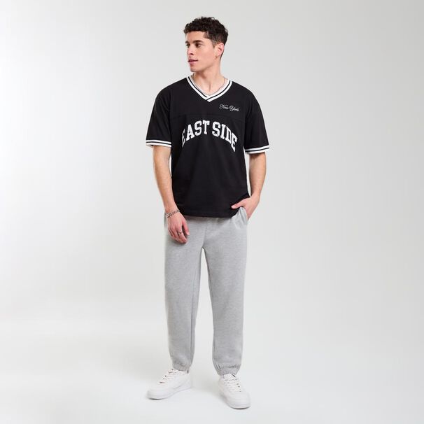 Pantal&oacute;n Liso Tiro Medio Slim Hombre Skuad