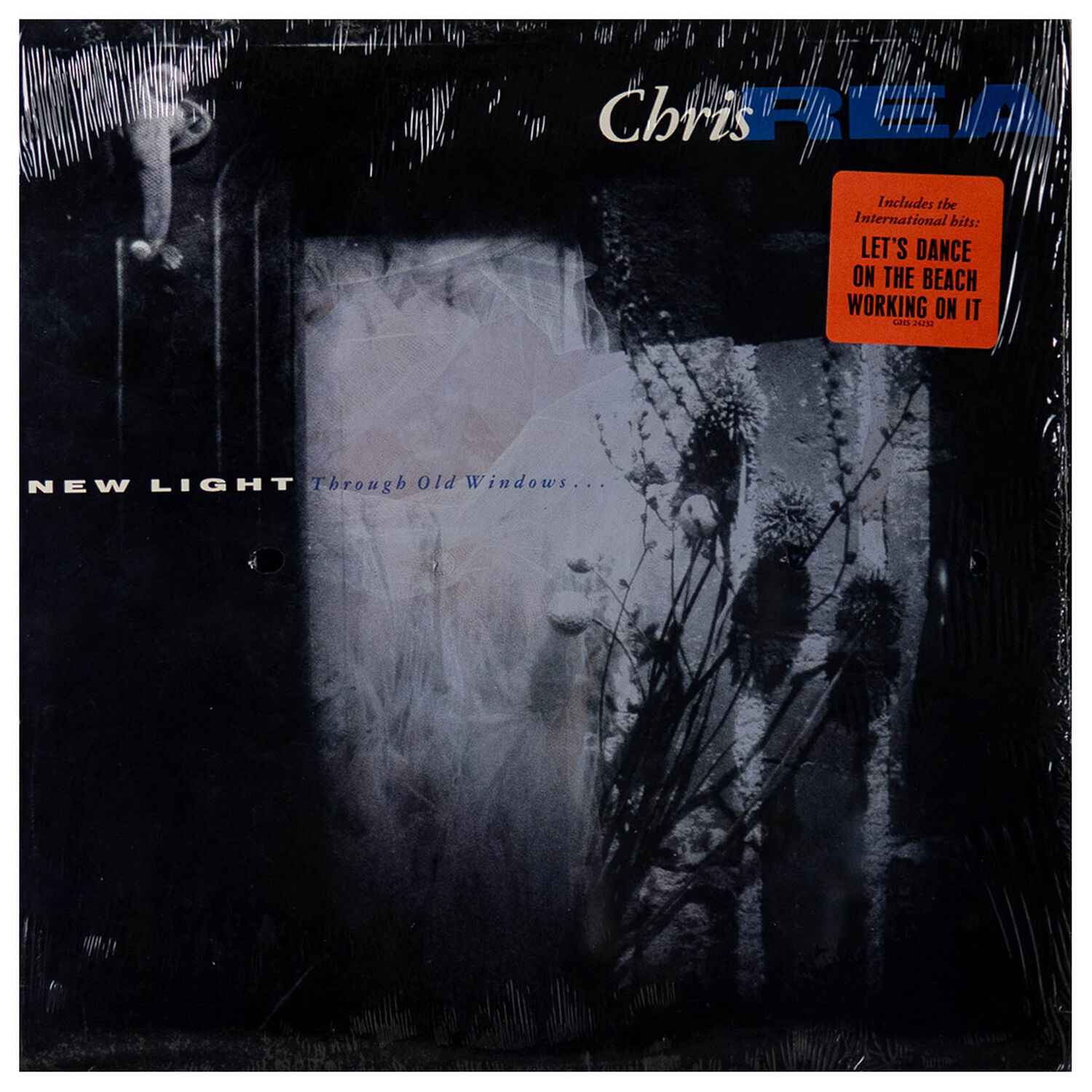 Chris Rea - New Light Through Old Windows | Vinilo Usado image number 0.0