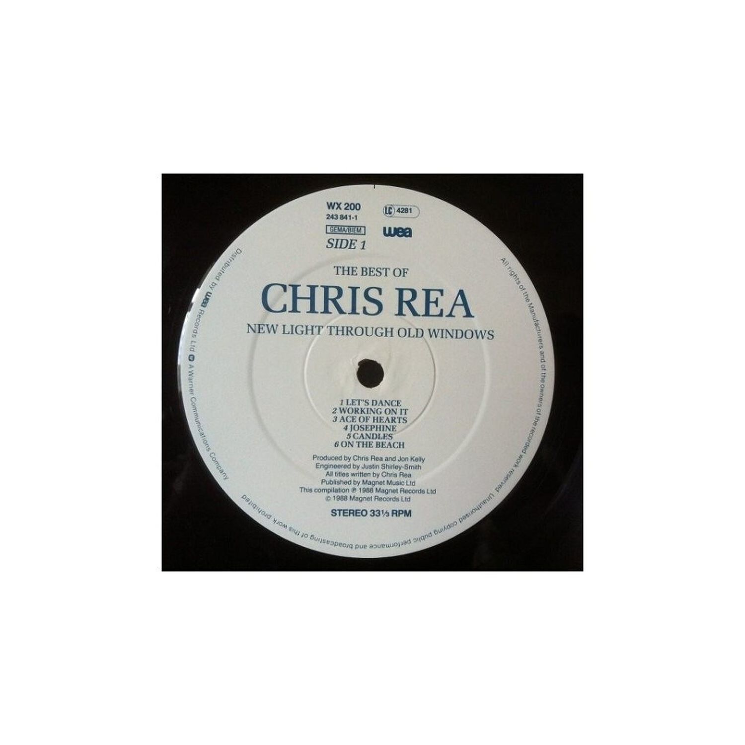 Chris Rea - New Light Through: The Best Of | Vinilo Usado image number 2.0