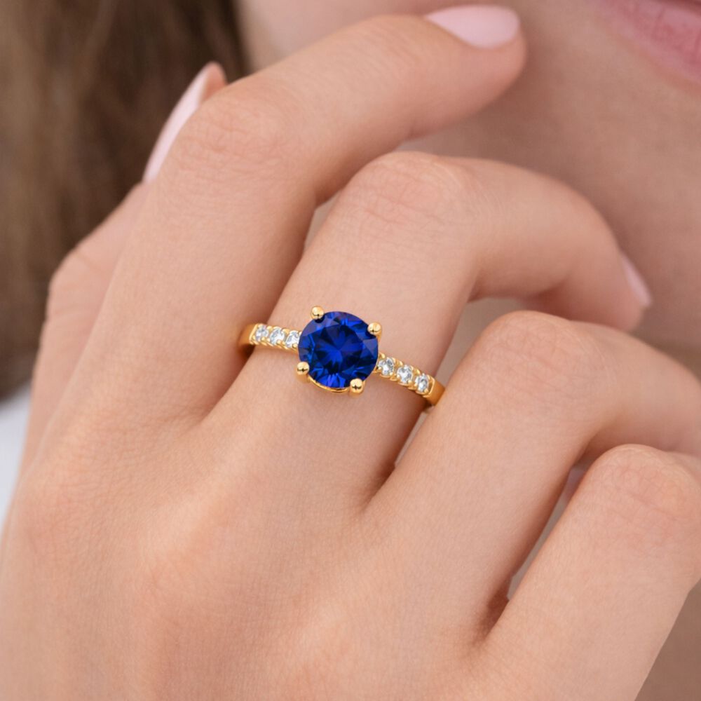 Anillo Solitario Princesa Oro 18k Con Cristal Central 5mm Azul image number 2.0