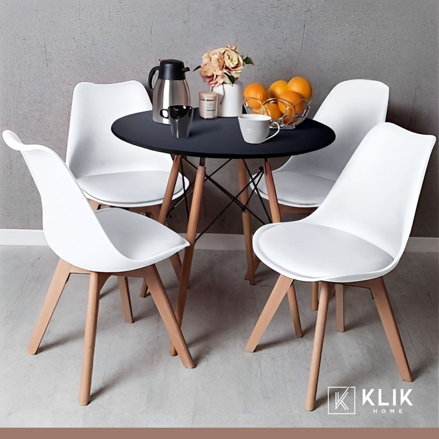 Comedor Mesa Eames Negra Redonda 80cm + 4 Sillas Tulip Blancas image number 1.0