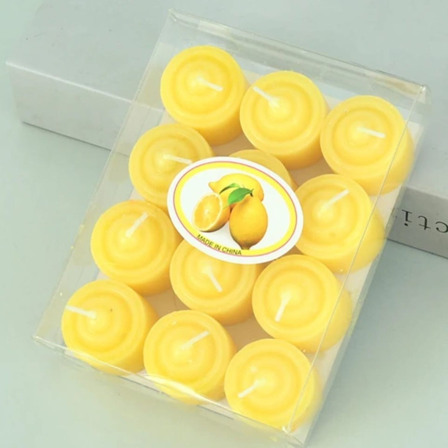 Pack De 12 Velas Amarillas Arom&aacute;ticas 3.5x 3.5 Cm image number 0.0