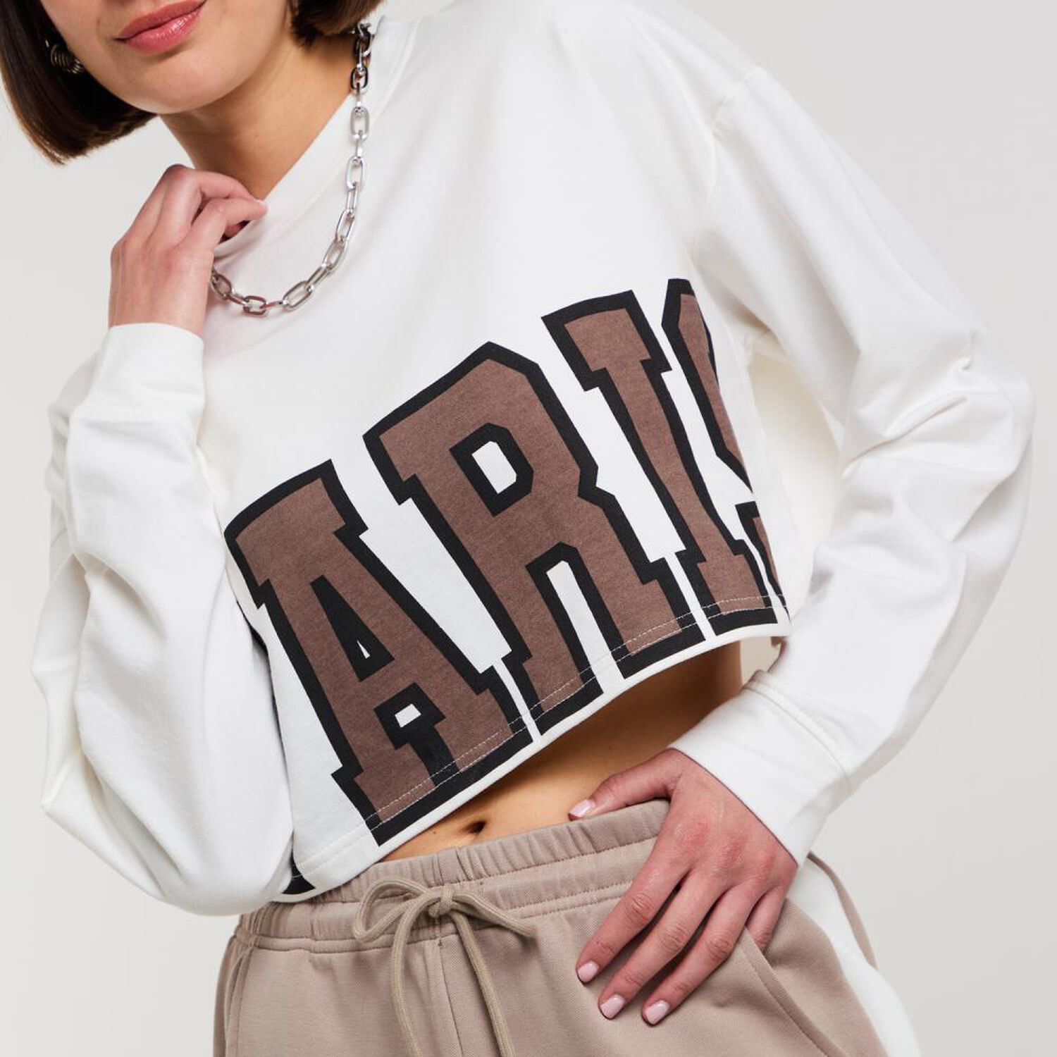 Poler&oacute;n Crop Top Manga Larga Cuello Redondo Mujer Rolly Go image number 4.0