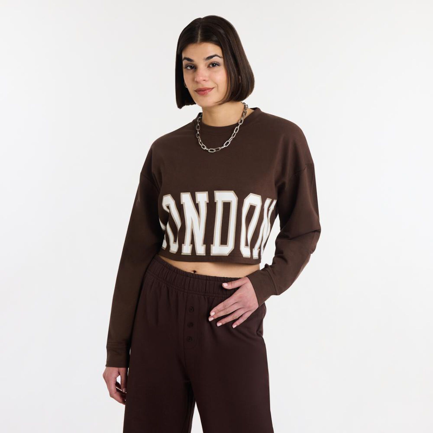 Poler&oacute;n Crop Top Manga Larga Cuello Redondo Mujer Rolly Go image number 0.0