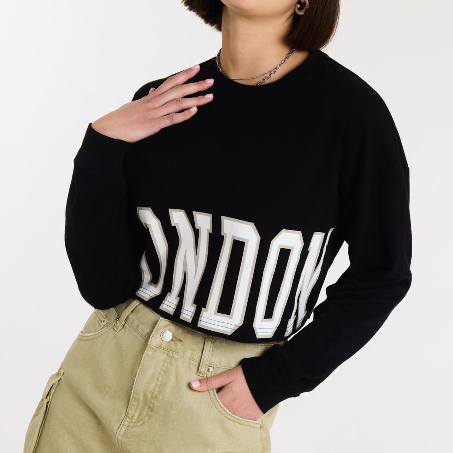 Poler&oacute;n Crop Top Manga Larga Cuello Redondo Mujer Rolly Go image number 4.0