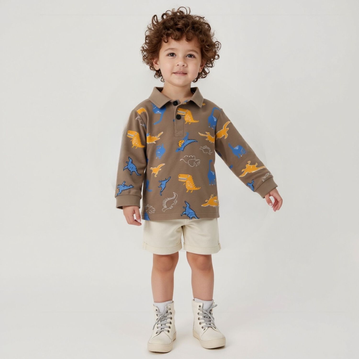 Polera Piqu&eacute; Manga Larga Ni&ntilde;o Con Estampado De Dinosaurios Marr&oacute;n image number 7.0