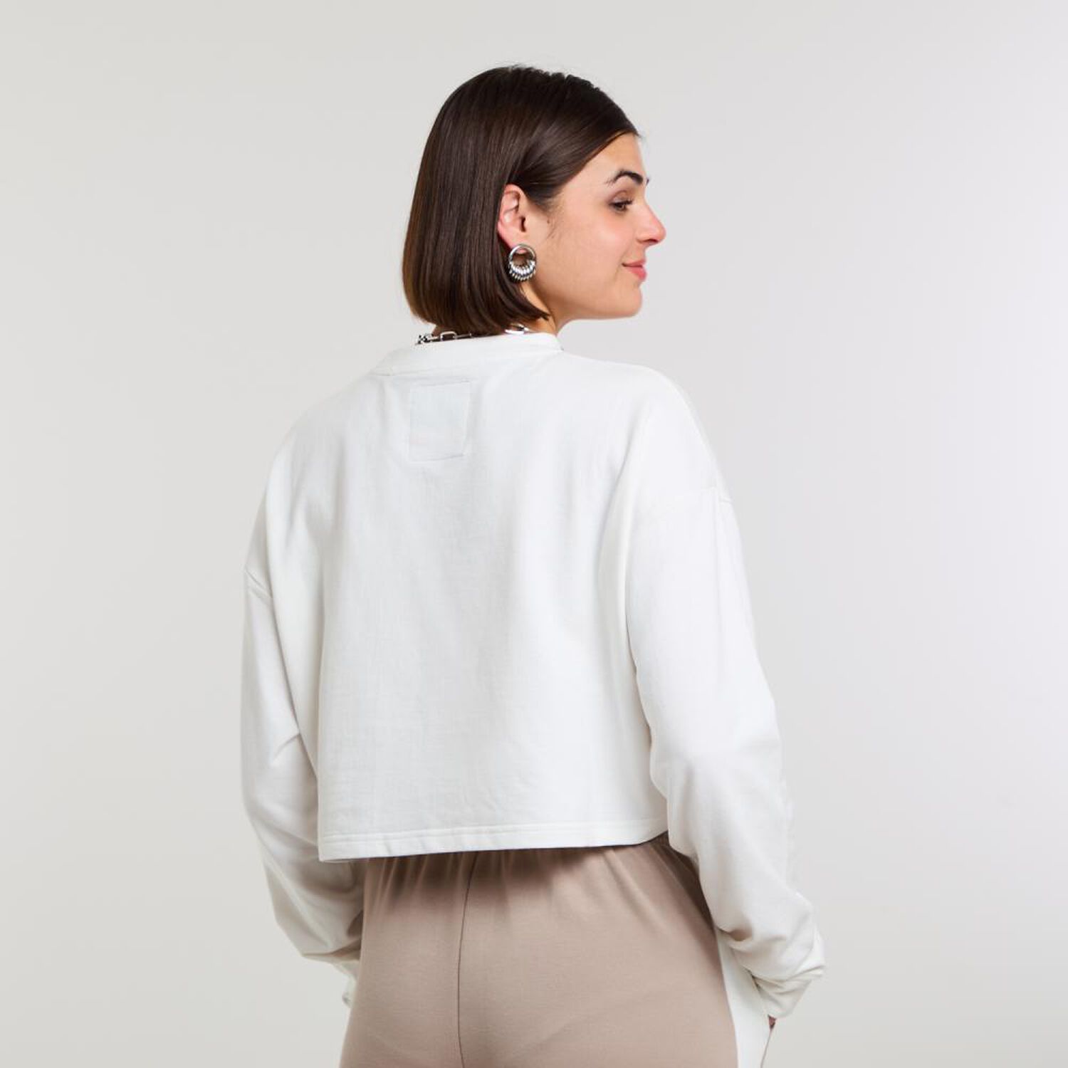 Poler&oacute;n Crop Top Manga Larga Cuello Redondo Mujer Rolly Go image number 3.0