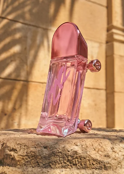 Perfume de mujer rosado sobre piedra al sol – Perfumes mujer hasta 60% dcto en Hites